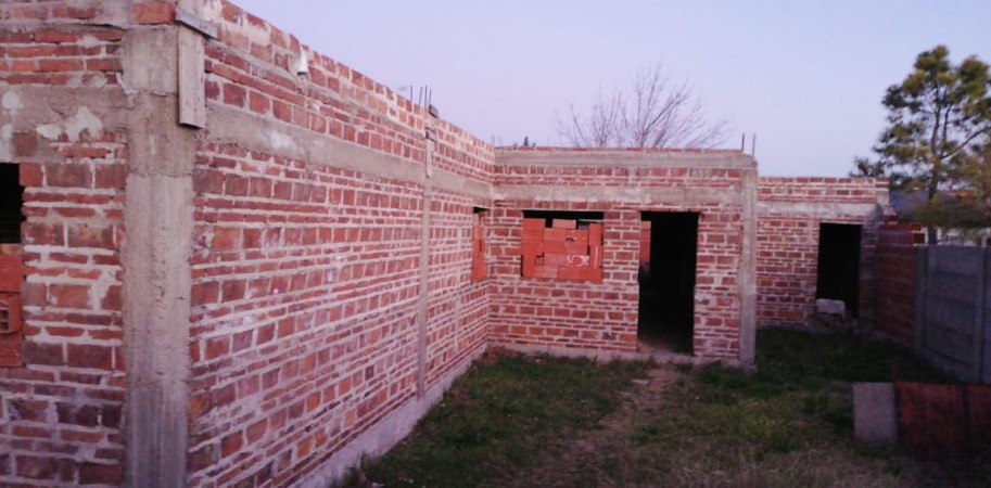 Terreno con obra techada 