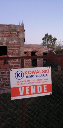 Terreno con obra techada 